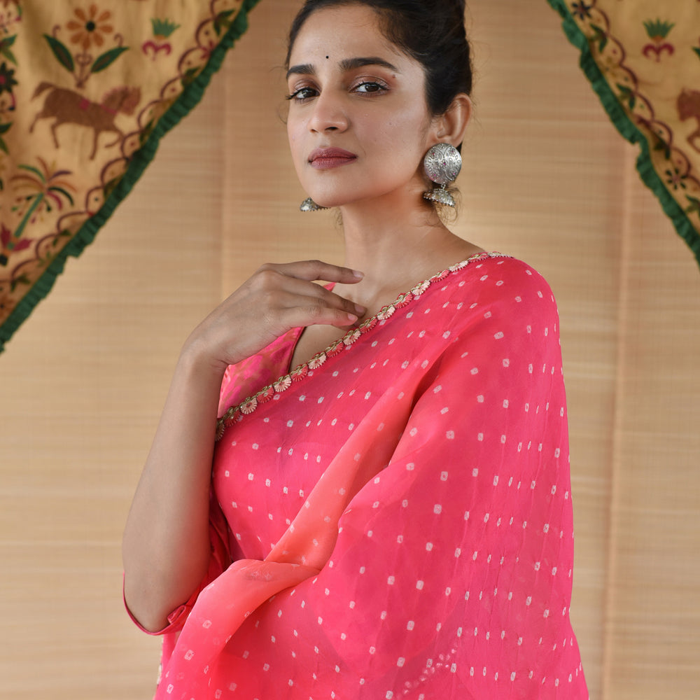 Shades of Pink and Peach Bandhani on Organza Saree with Gota Patti