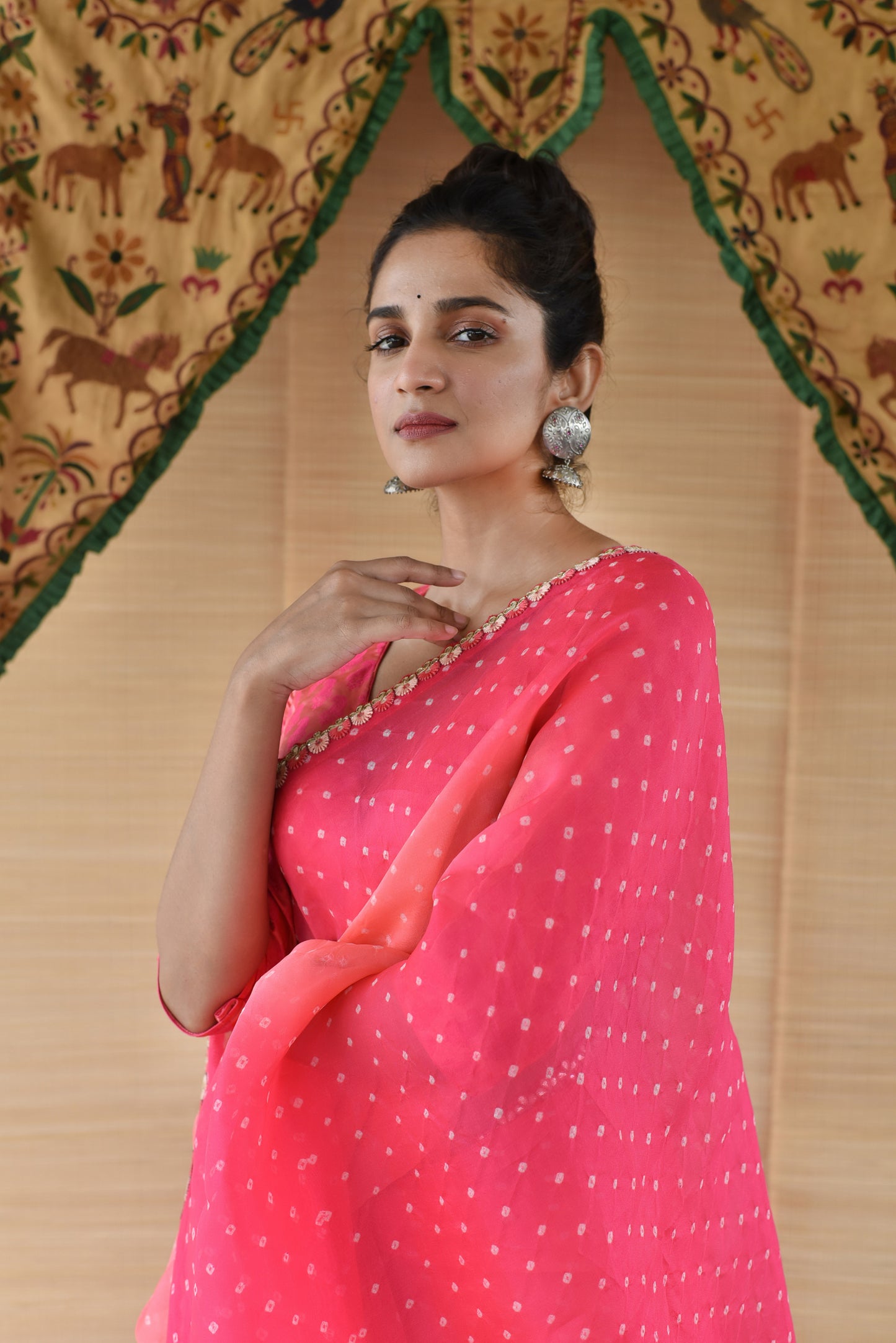 Shades of Pink and Peach Bandhani on Organza Saree with Gota Patti