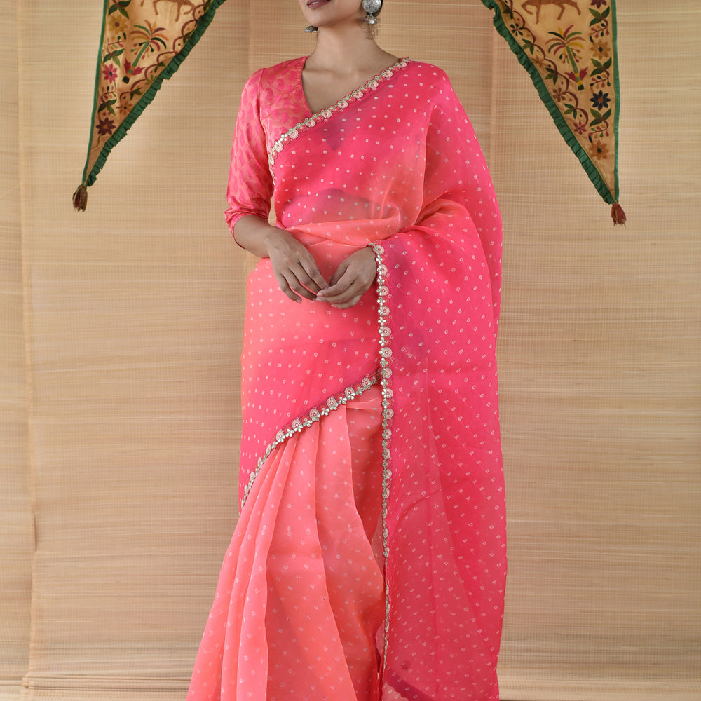 Shades of Pink and Peach Bandhani on Organza Saree with Gota Patti