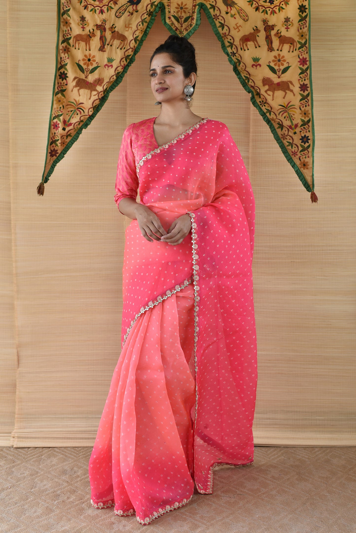 Shades of Pink and Peach Bandhani on Organza Saree with Gota Patti