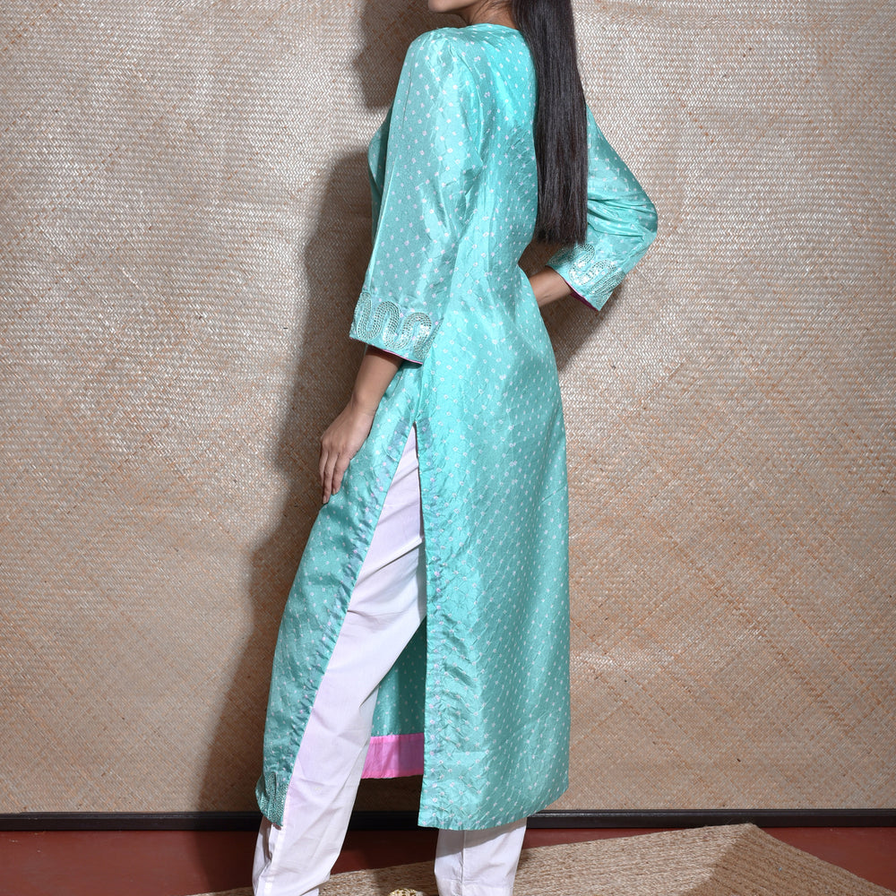 
                      
                        Sky Blue Bandhani on Silk Kurta with Mirror Work
                      
                    