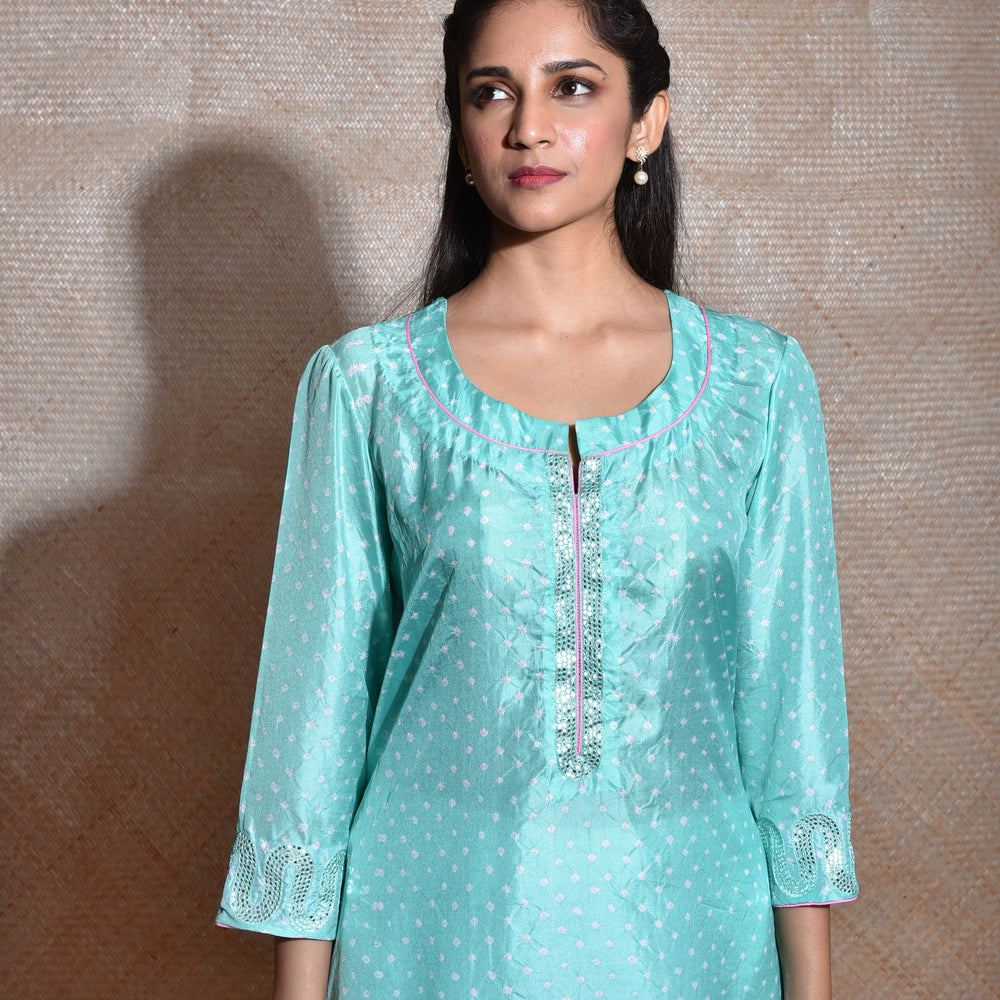 
                      
                        Sky Blue Bandhani on Silk Kurta with Mirror Work
                      
                    