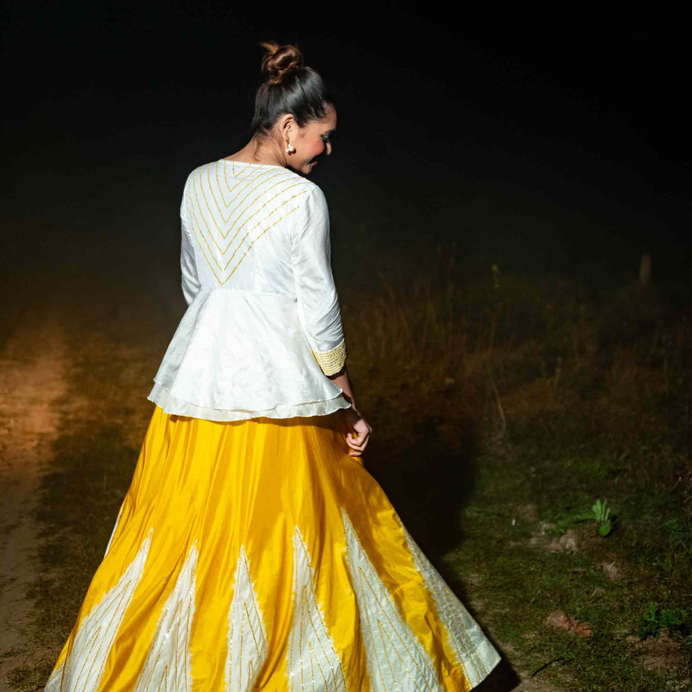 
                      
                        Taara Lehenga - White and Yellow
                      
                    