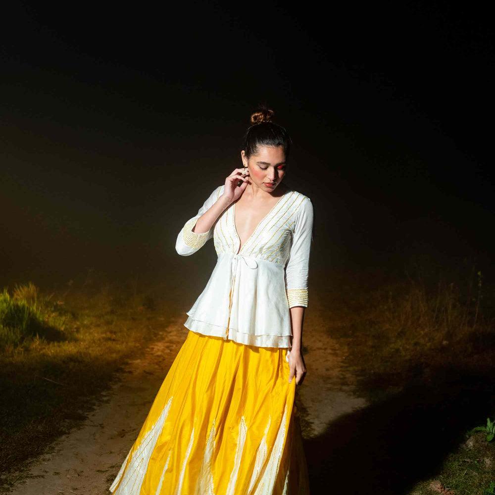 
                      
                        Taara Lehenga - White and Yellow
                      
                    