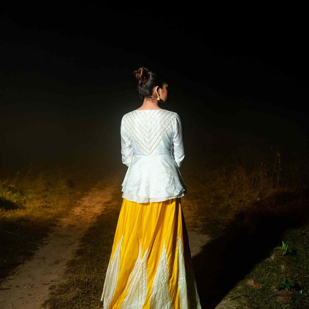 
                      
                        Taara Lehenga - White and Yellow
                      
                    