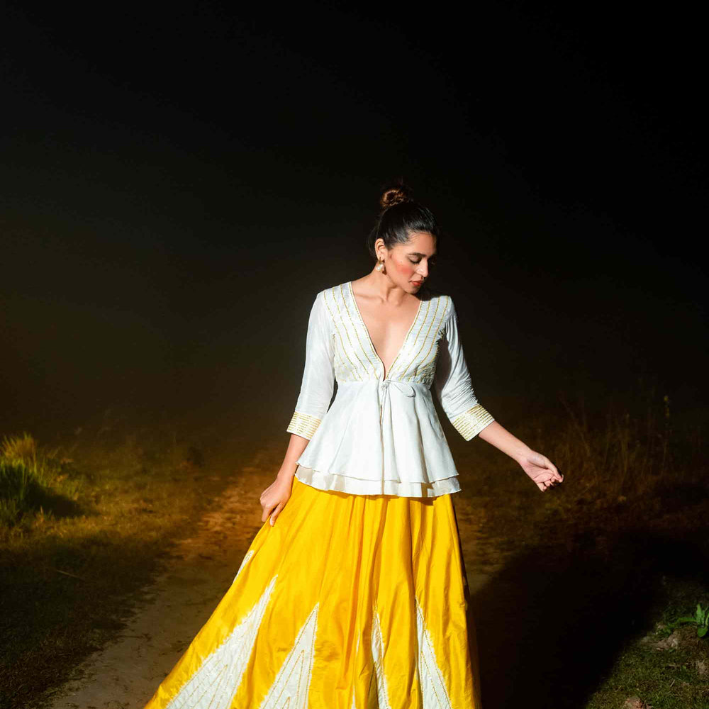 
                      
                        Taara Lehenga - White and Yellow
                      
                    