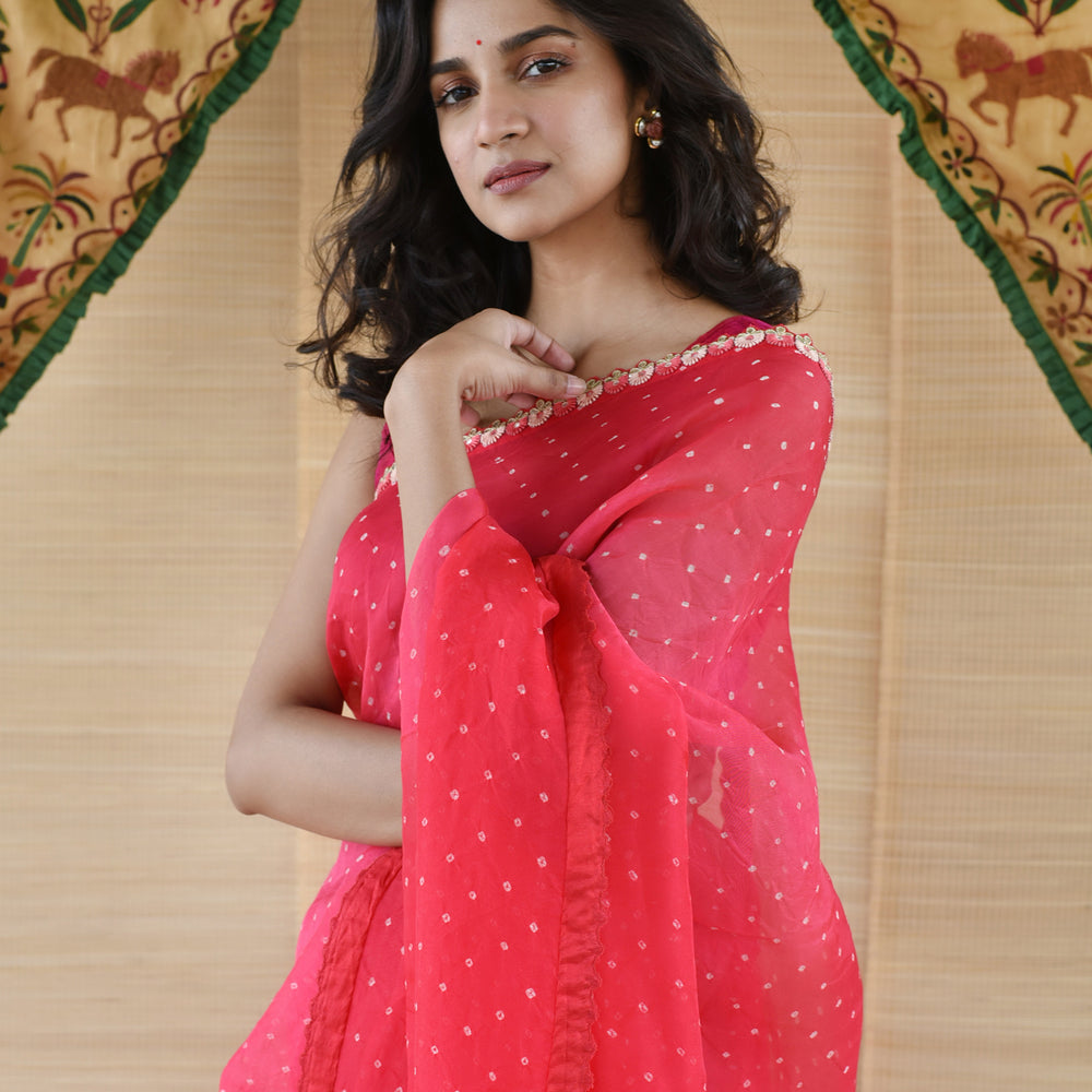 
                      
                        Tomato Pink Red Bandhani on Organza Saree with Gota Patti
                      
                    