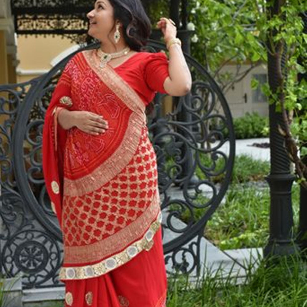 
                      
                        Pure Zari Banarasi Bandhani Saree in a Festive Red
                      
                    