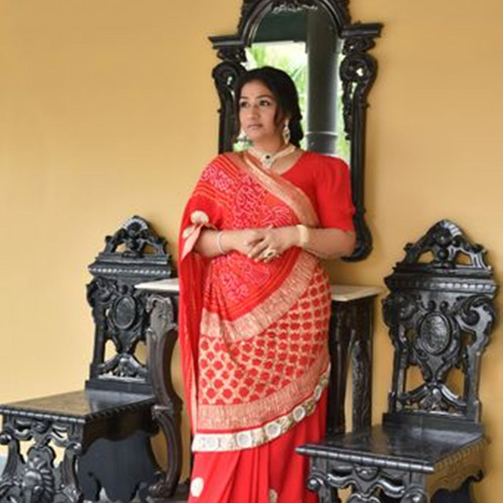 
                      
                        Pure Zari Banarasi Bandhani Saree in a Festive Red
                      
                    